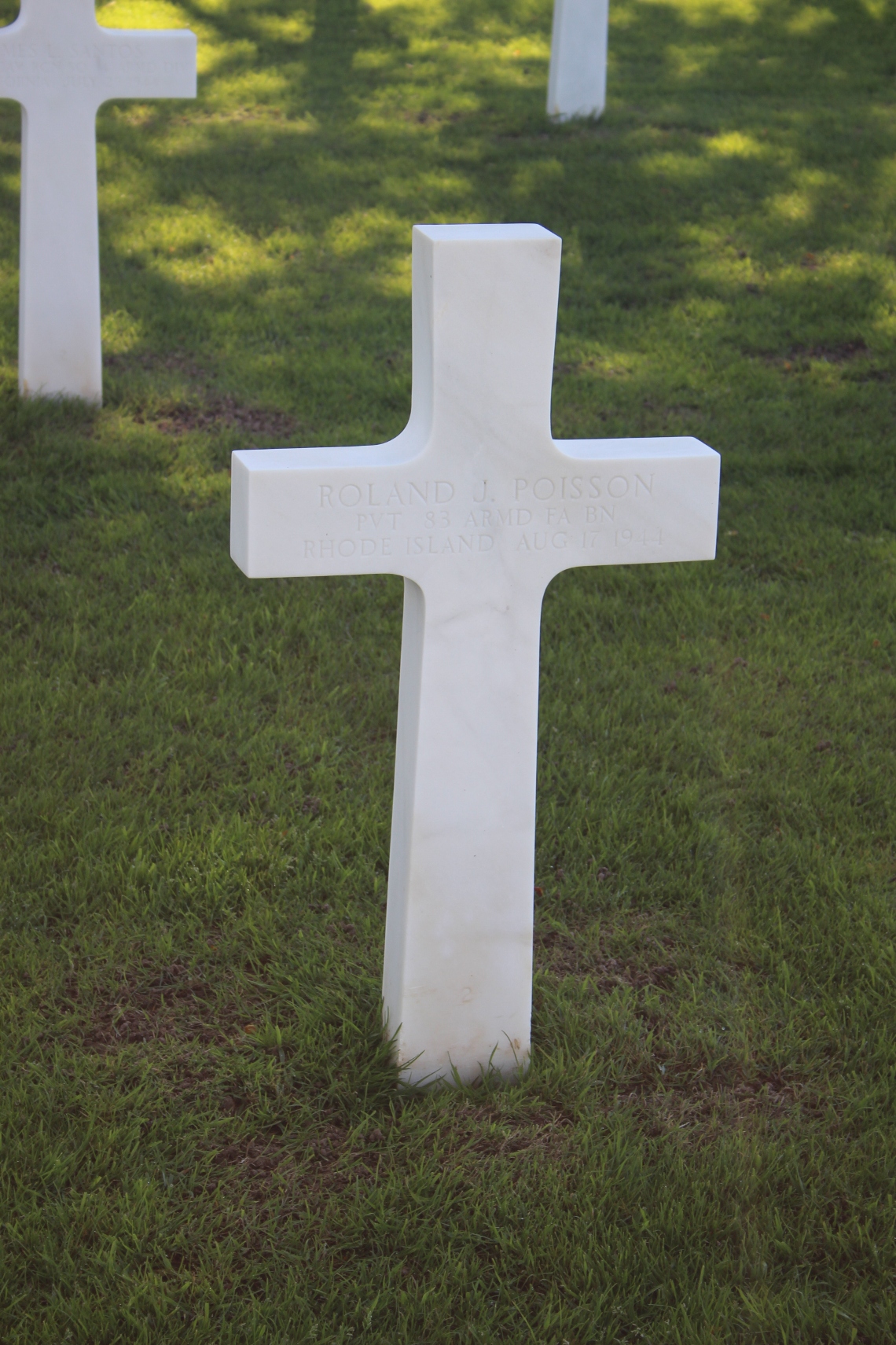 Roland J. Poisson †